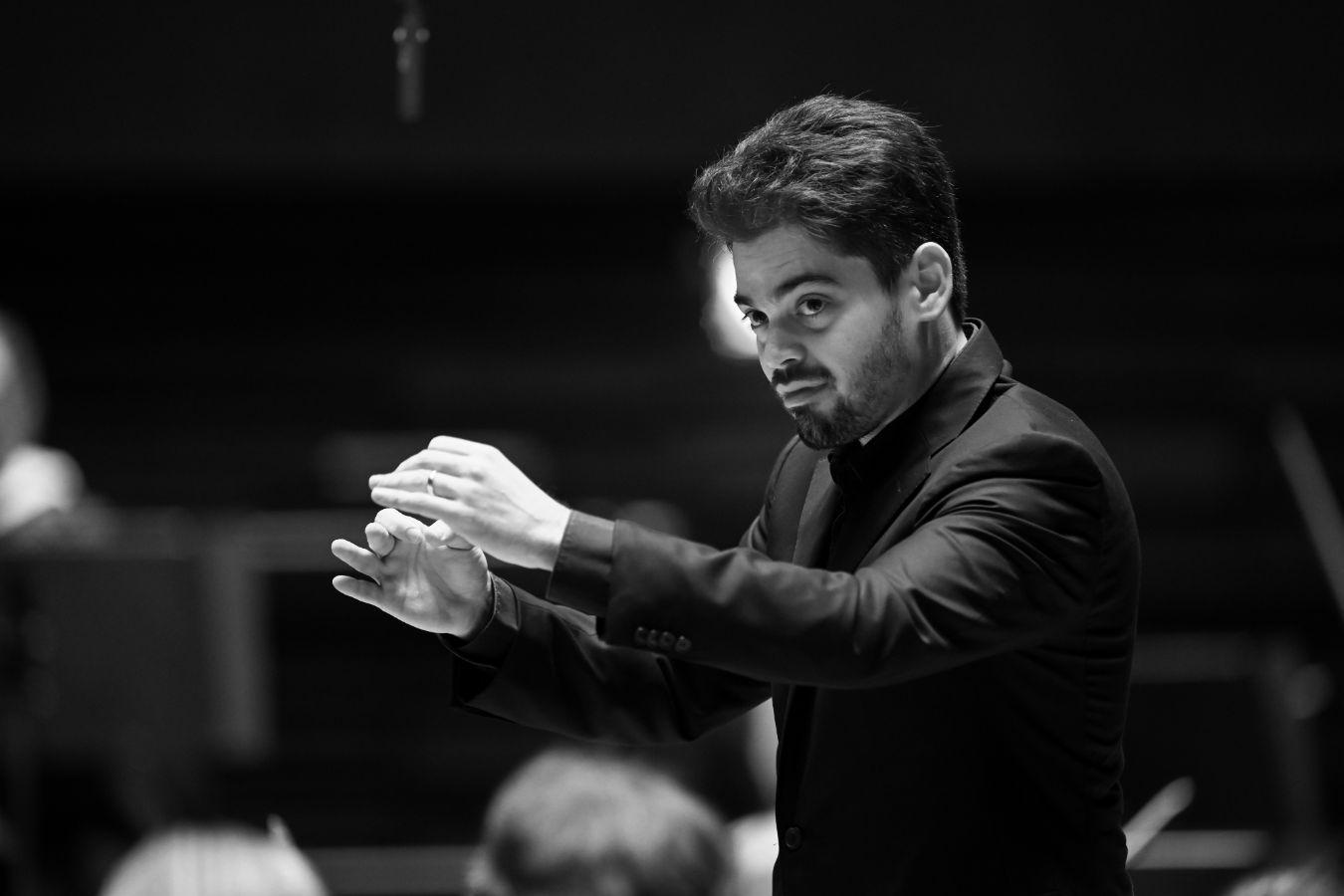 Lahav Shani conducts.