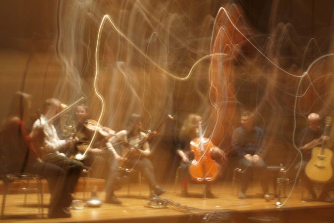 A long-exposure image from a performance of Ensemble Dedalus.