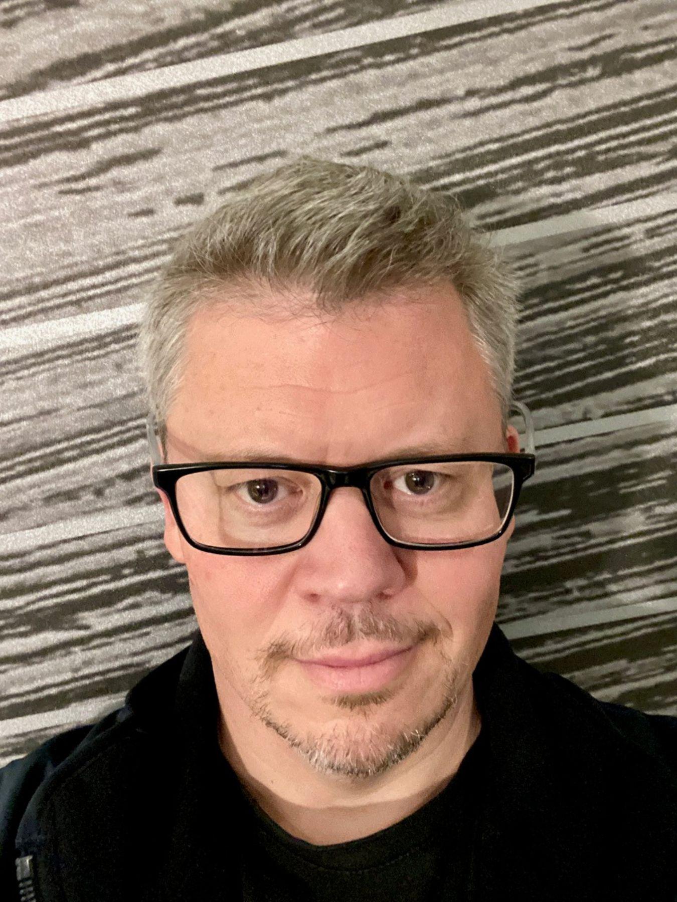 Portrait of a man with glasses