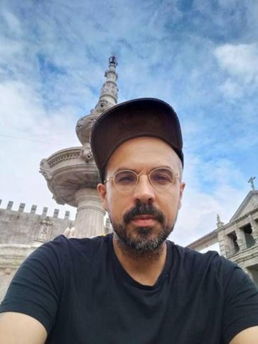 Portrait of Fernando da Ponte with Cap in front of a fountain