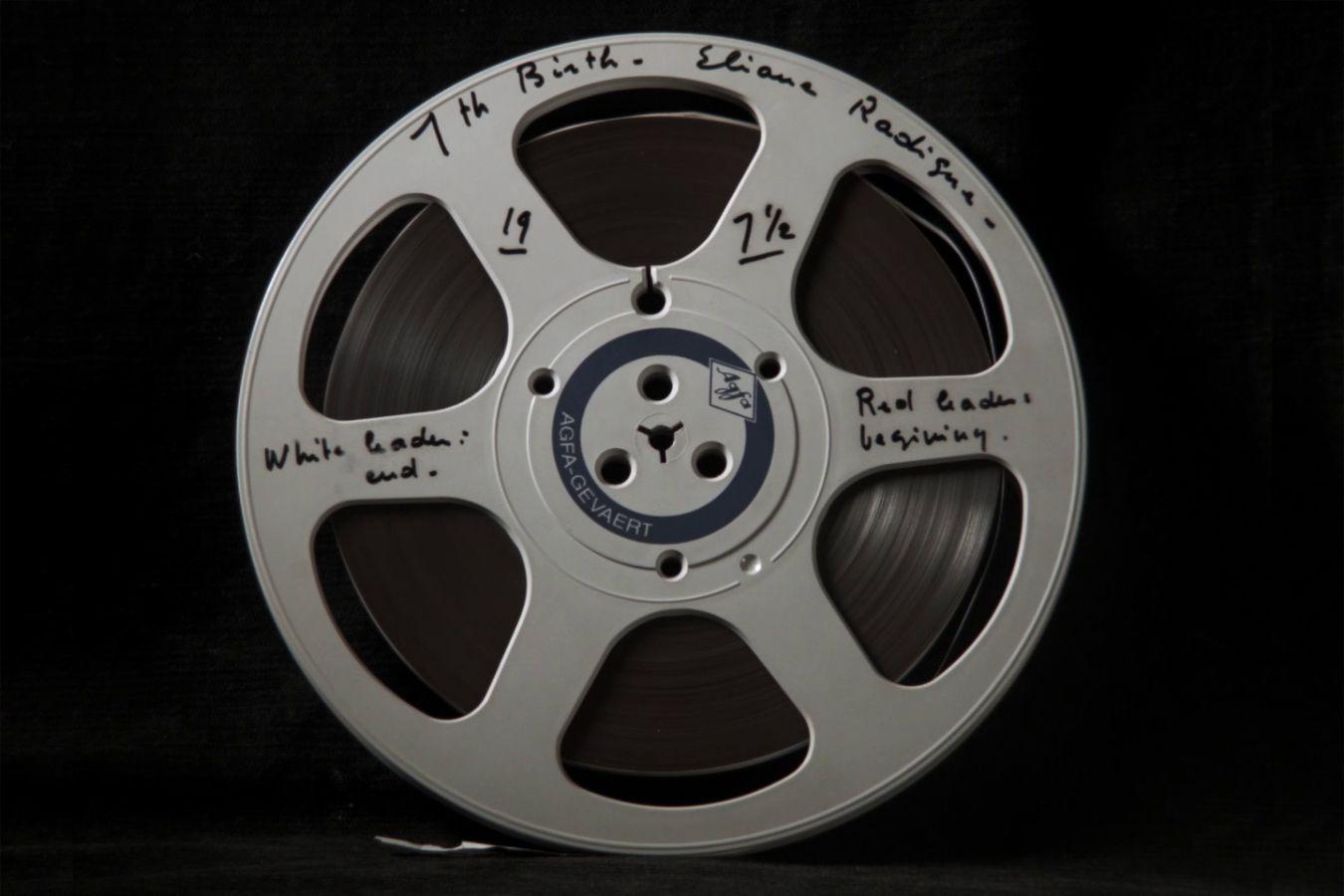 Labelled magnetic tape reel with the recording of the composition 7Th birth by Élaine Radigue