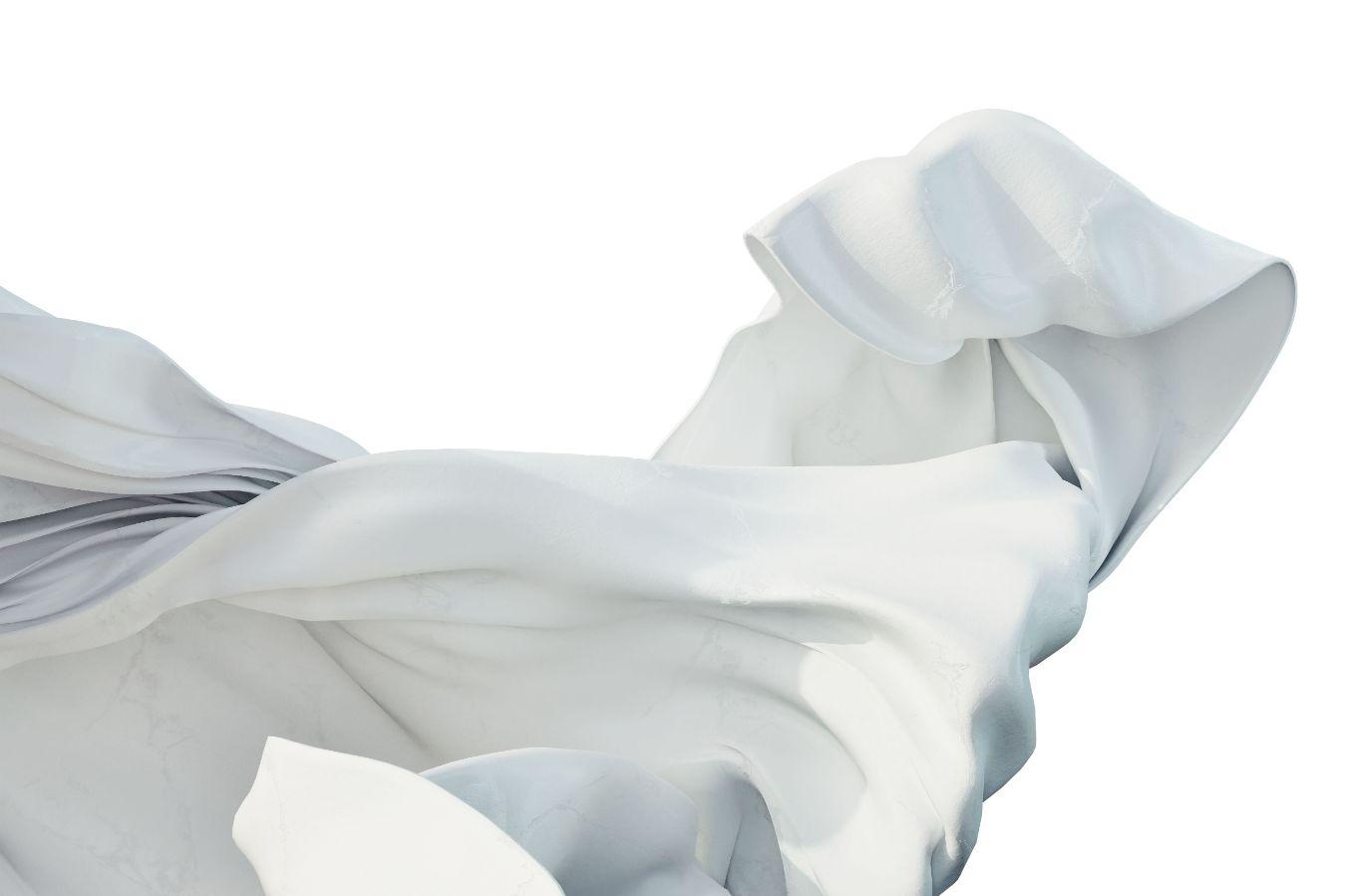 Ein großes, weißes Tuch weht.