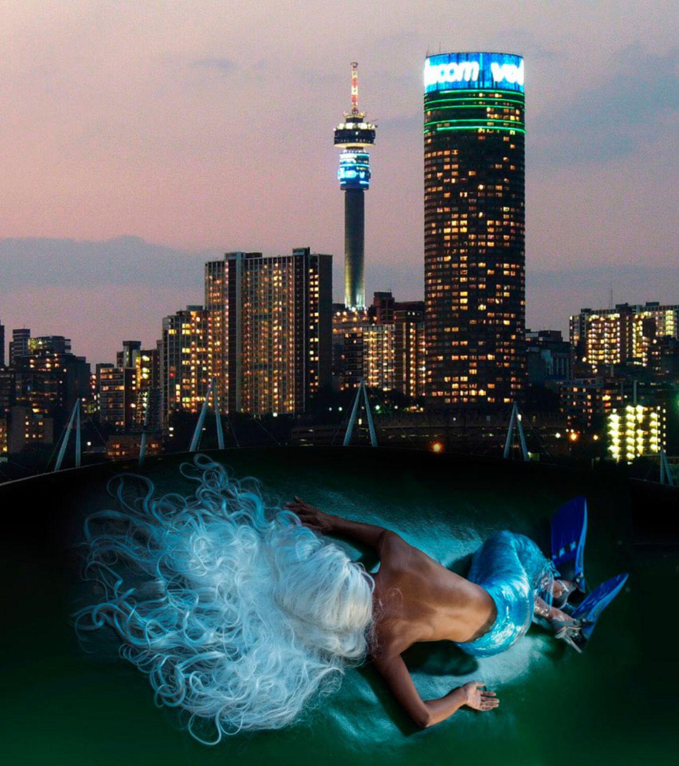 Urban Mermaid © Mocke J van Veuren, skyline photo by Chris7cn