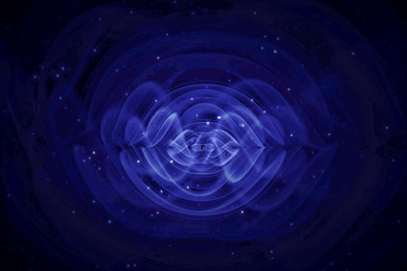 Simulation of gravitational waves generated by a collision between two black holes © Henze / NASA