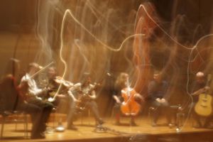 A long-exposure image from a performance of Ensemble Dedalus.