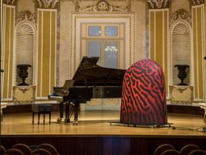 Iamus computer in a concert hall © Promo