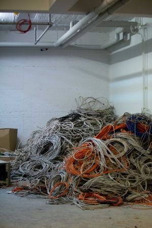 Dismantled cables and pipes in the storage of the stage, basement