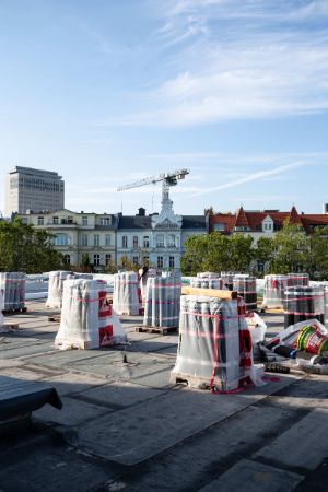 Delivery of roofing felt, roof of the hall